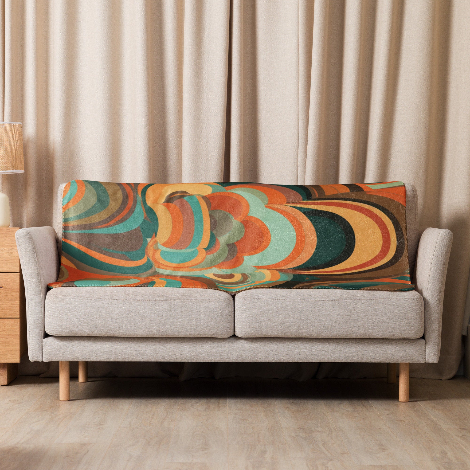 Warm and stylish sherpa blanket featuring retro-inspired abstract design