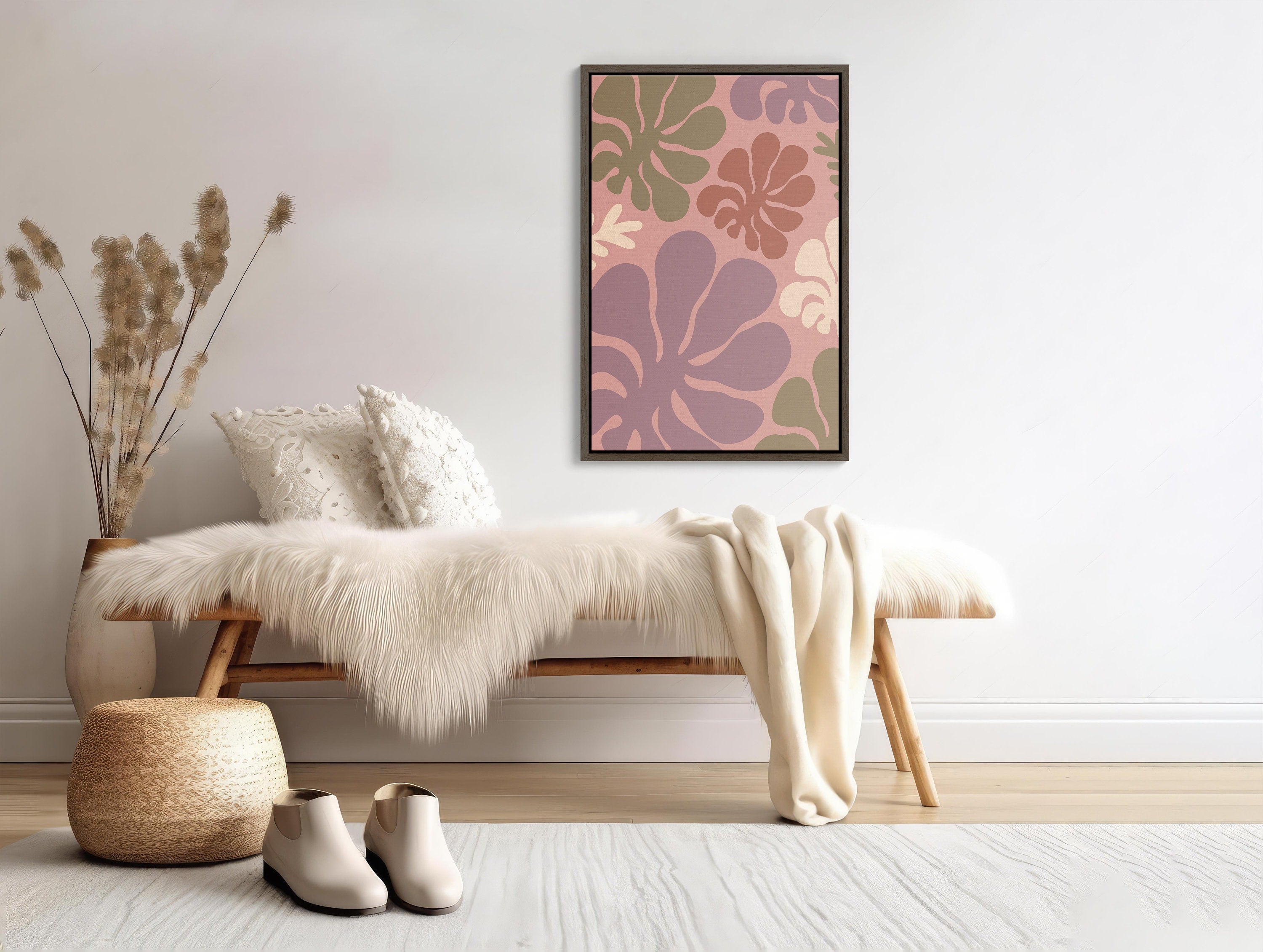 Framed wall art with intricate pink and gold floral patterns