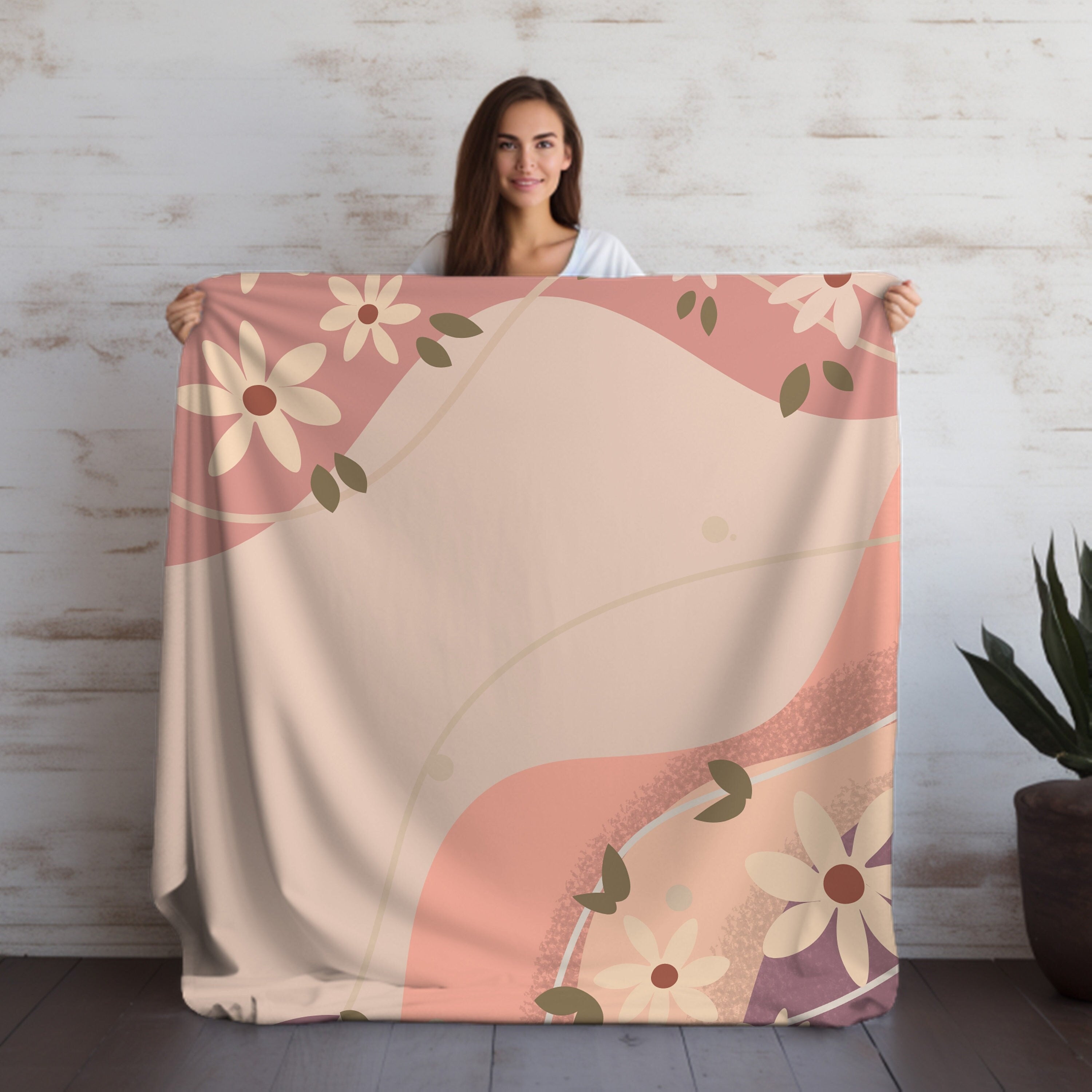 Soft pink velveteen throw blanket with boho design for cozy nights